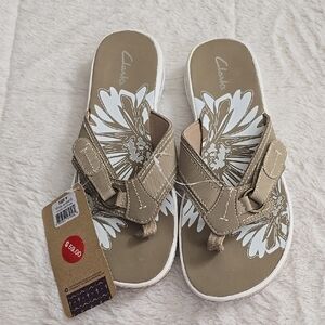 Clarks White and Tan Sandals with Intricate Strap Design